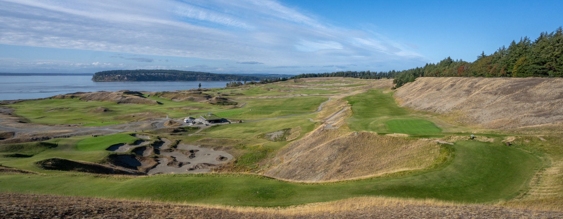 scenic view of sprawling hills down to the water